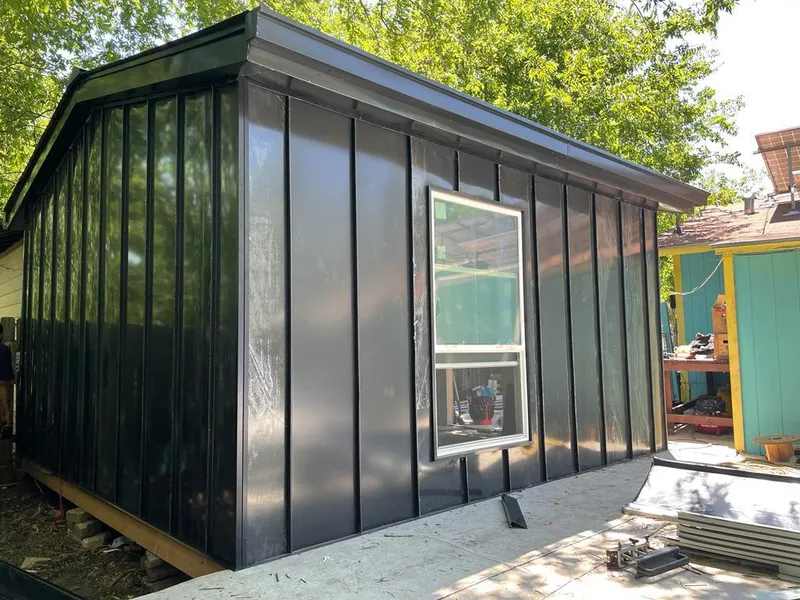 Black standing seam metal wall panels for Metal Roof Installation in Westwood